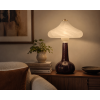 Lampa stołowa vintage z ceramiczną podstawą.