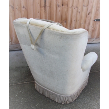 Fotel uszak welurowy – detal tapicerki i struktura tkaniny